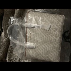 Michael Kors purse & Cleaner